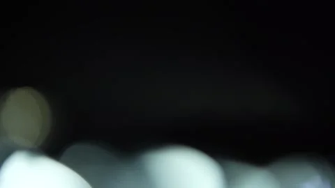 Out-of-focus white bokeh video on the left Stock Footage 315315544