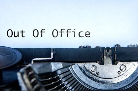 Out of Office text on an old typewriter. Off work concept. Stock Photos