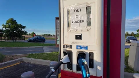 Out of order EV charging station with a temporary sign in Dorchester, Ontario Stockbeeldmateriaal 342341380