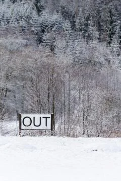 Out sign in snowy landscape, New Years Resolutions, self-improvement concept, Stock Photos