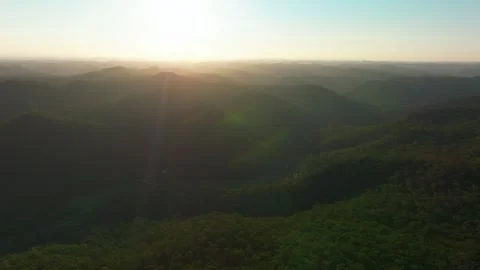 Outback vibrant mountain layers yellow sunset sunrise aerial drone horizon Stock Footage 287588485