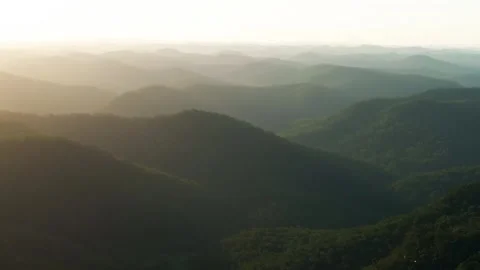 Outback vibrant mountain layers yellow sunset sunrise aerial drone horizon Stock Footage 287588494