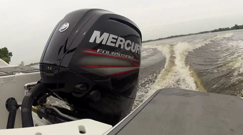 Outboard engine on small boat Stock Footage 39831230