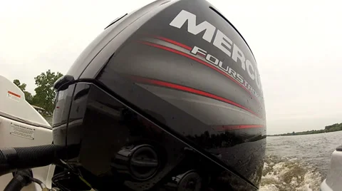Outboard engine on small boat Stock Footage 39831290
