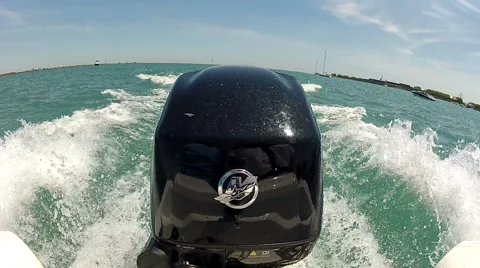 Outboard engine on small boat Stock Footage 40184072