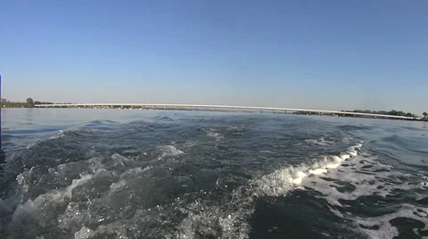 Outboard Motor Wake With Bridge Stock Footage 56635446
