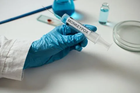 Outbreak of type smallpox disease. Monkeypox research search for effective v Stock Photos