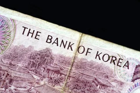 Outdated 1000 Korean Won note of 1983 issued on a black background close-up 스톡 사진