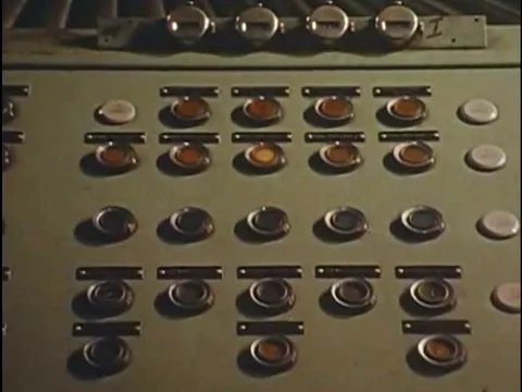An outdated adding machine is compared to outdated 16 mm sound film projectors, Stock Footage 79458689