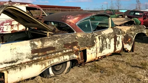 Outdated American white car. Scrap car footage. Stock Footage 253132352