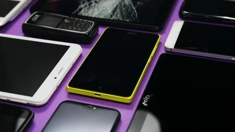 Outdated and modern models of smartphones and mobile phones Stock Footage 130797541