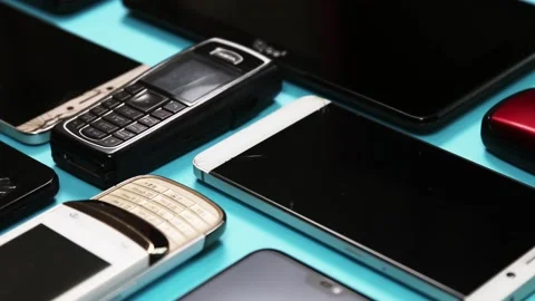Outdated and modern models of smartphones and mobile phones Stock Footage 132381421