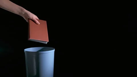 Outdated book in bin. 스톡 동영상 254519607