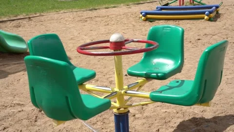 Outdated children attraction of red yellow and green colours Stock Footage 134905247