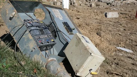 A Outdated Cirtcuit Breaker in Construction Rubble Stock Footage 318763571