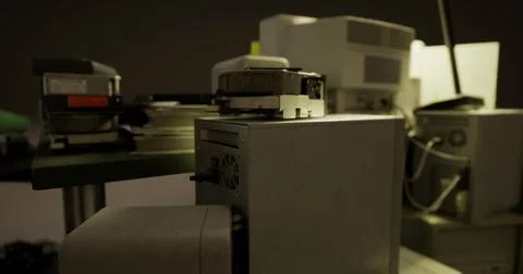 Outdated computer equipment in a dimly lit workspace environment Stock Illustration