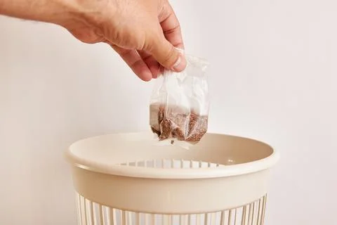 Outdated flax seeds are processed and thrown into the trash. The concept of.. Stock Photos