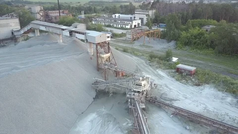 Outdated mining sector equipment at large grey rubble barrow Stock Footage 115671936