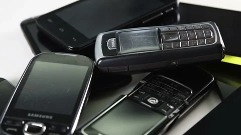 Outdated models of mobile phones and smartphones Stock Footage 88174830