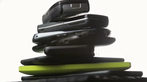 Outdated models of mobile phones and smartphones Stock Footage 88175002