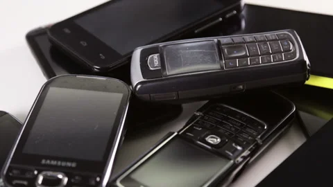 Outdated models of mobile phones and smartphones Stock Footage 88701051