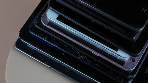 Outdated models of mobile phones and smartphones. Rotation of old smartphones. Stock Footage 202091674