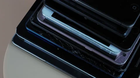 Outdated models of mobile phones and smartphones. Rotation of old smartphones. Stock Footage 202091710