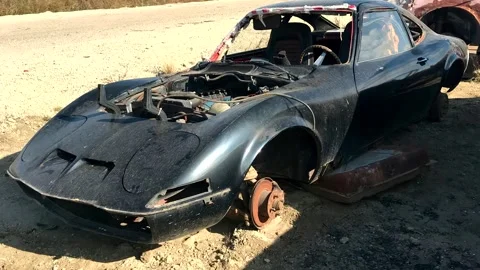 Outdated super car. Scrap car footage. Stockbeeldmateriaal 253132119