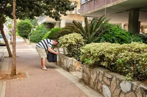 Outdated television at the side of a road Foto stock