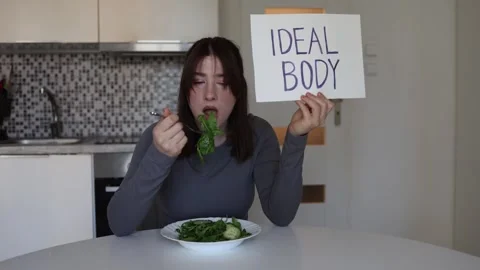 Outdated unhealthy dieting mindset Video stock 334576548