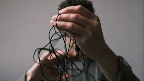 Outdated vlog gear. Wired Lavalier Microphone shows old tech limitations. Stock Footage 311570339