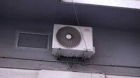 Outdoor AC unit mounted on wall Stock Footage 320257796