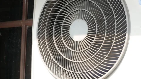 Outdoor Air Conditioner Condenser Unit Running in Daylight Stock Footage 342259795