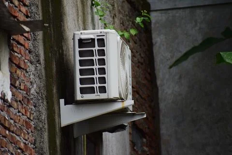 Outdoor air conditioning unit compressor Stock Photos