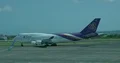 Outdoor airfield scenery Thai Airways Boeing 747 slowly moving 4k or 4k+ Resolution