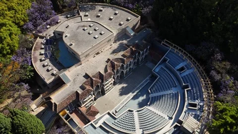 Outdoor amphitheater complex circular pool gardens Marbella aerial view 動画素材 336447589