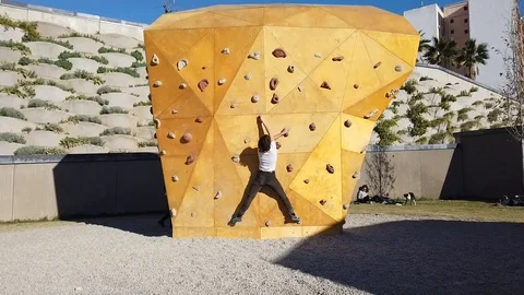 Outdoor Artificial Climbing Wall Stock Footage 100587322