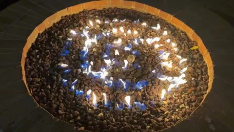Outdoor, backyard firepit with flames in slow motion Stock Footage 247249577