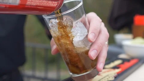 Outdoor Bartender Pours a Soda Stock Footage 89502138