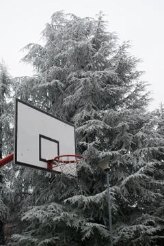 Outdoor basketball court on the cold winter day Stock Photos
