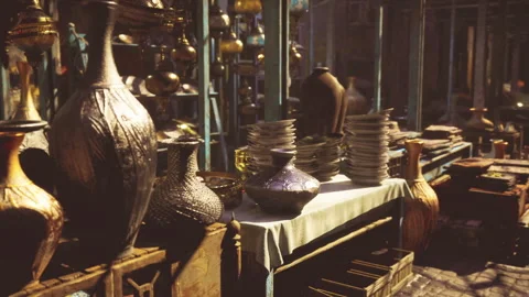 Outdoor bazaar illuminated by sunlight featuring handcrafted pottery and vessels Видео 340351329
