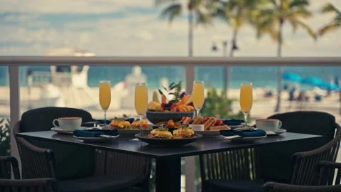 Outdoor Breakfast Setup With Mimosas Waffles Eggs Fruit Coffee Resort Hotel 库存影片 280507555
