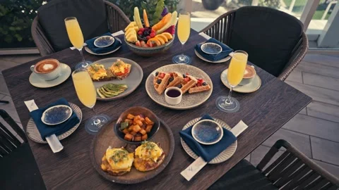 Outdoor Breakfast Setup With Mimosas Waffles Eggs Fruit Coffee Resort Hotel Stockbeeldmateriaal 280507563