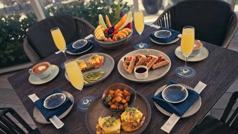 Outdoor Breakfast Setup With Mimosas Waffles Eggs Fruit Coffee Resort Hotel Vidéo 280507566