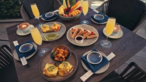Outdoor Breakfast Setup With Mimosas Waffles Eggs Fruit Coffee Resort Hotel Stock Footage 280507568