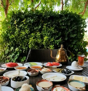 Outdoor breakfast table Stock Photos