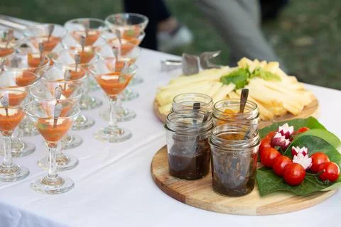 Outdoor buffet table offering a selection of gourmet appetizers Stock-Fotos