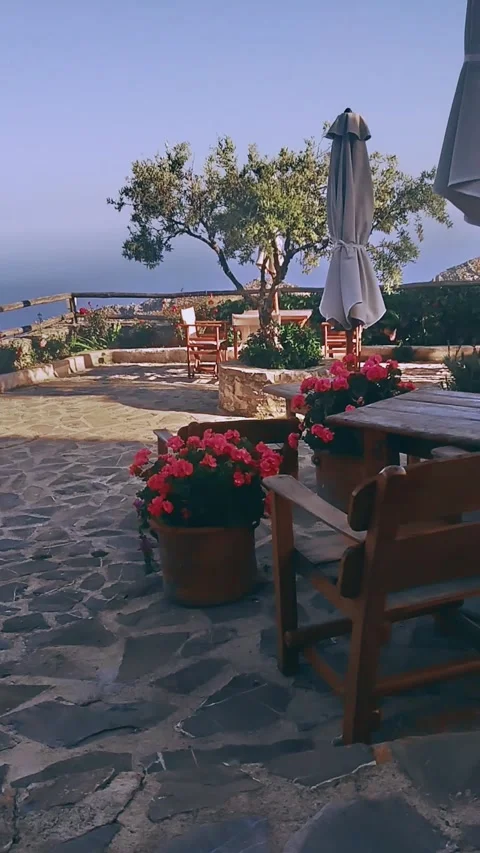 Outdoor Café with Olive Tree in a Mountain Village with Sea View in Crete Stock Footage 307754203