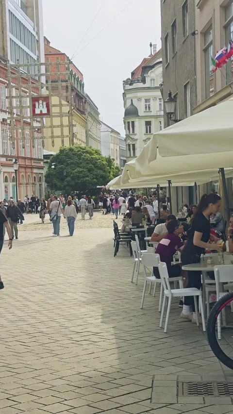 Outdoor cafes and restaurants create a vibrant dining atmosphere along Stock Footage 340375065