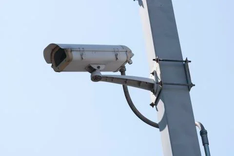 Outdoor CCTV Camera Operating for security in garden , on blue sky background Stock-Fotos